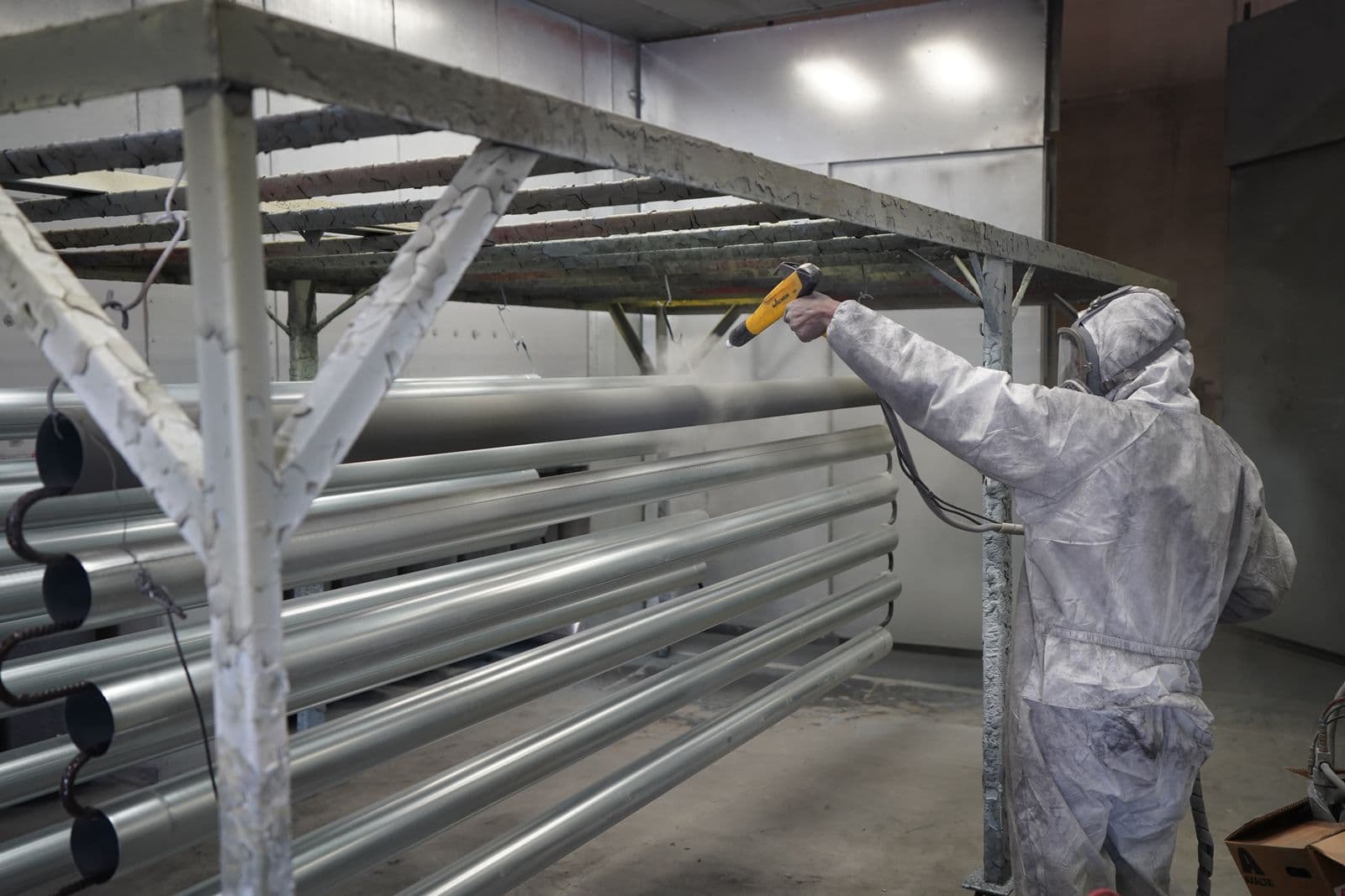 Powder coating application on metal parts — durable protective finish